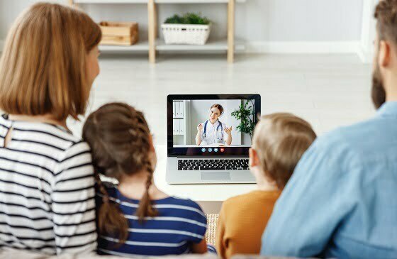 family watching a video